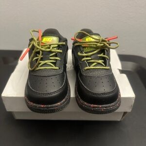 Nike Kids Black Sneakers with Lime Green and Red Accents